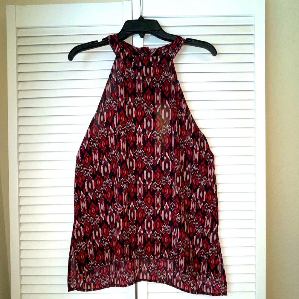 Womens tunic length sleeveless blouse